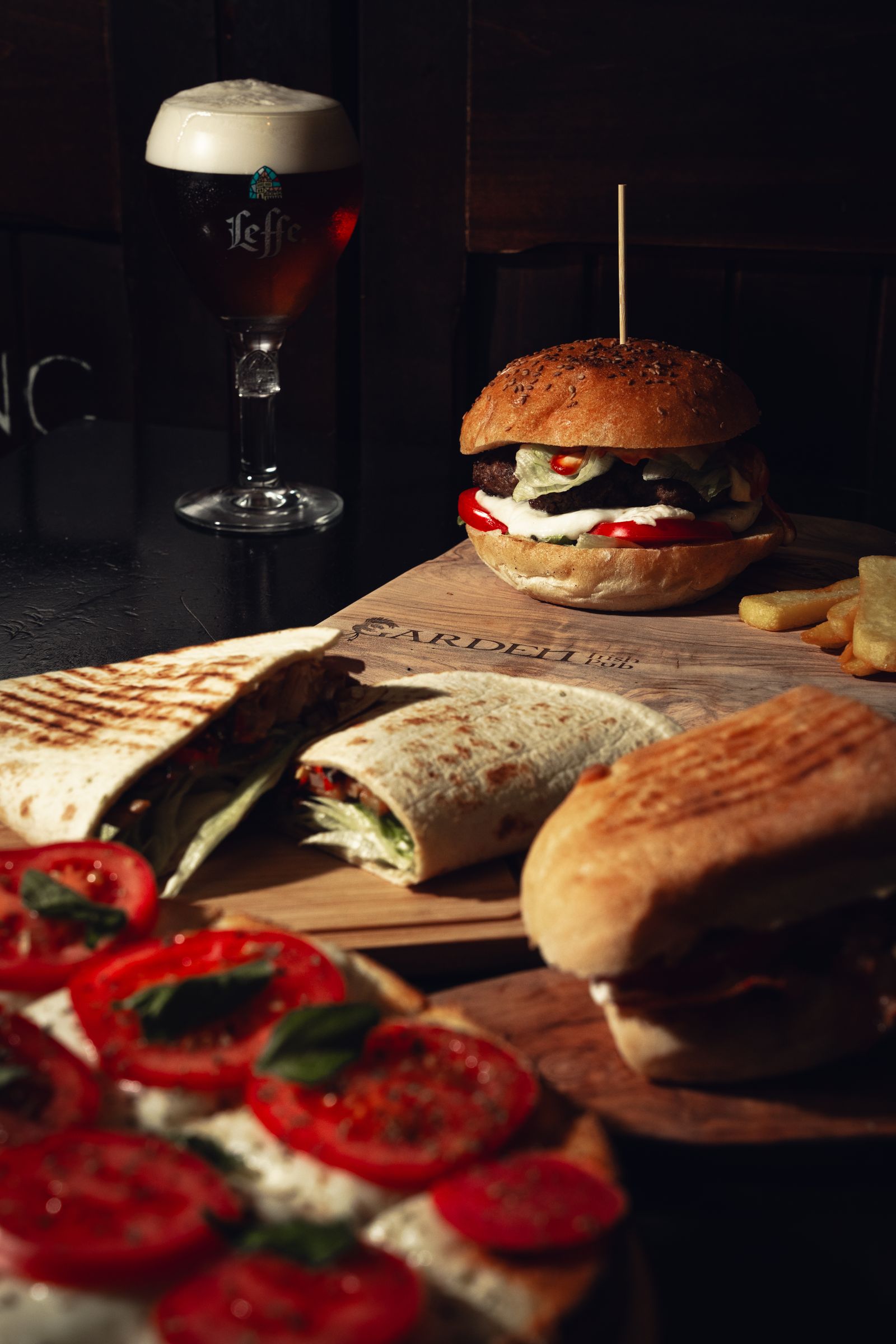Burger with fresh mozzarella, tomato and basil