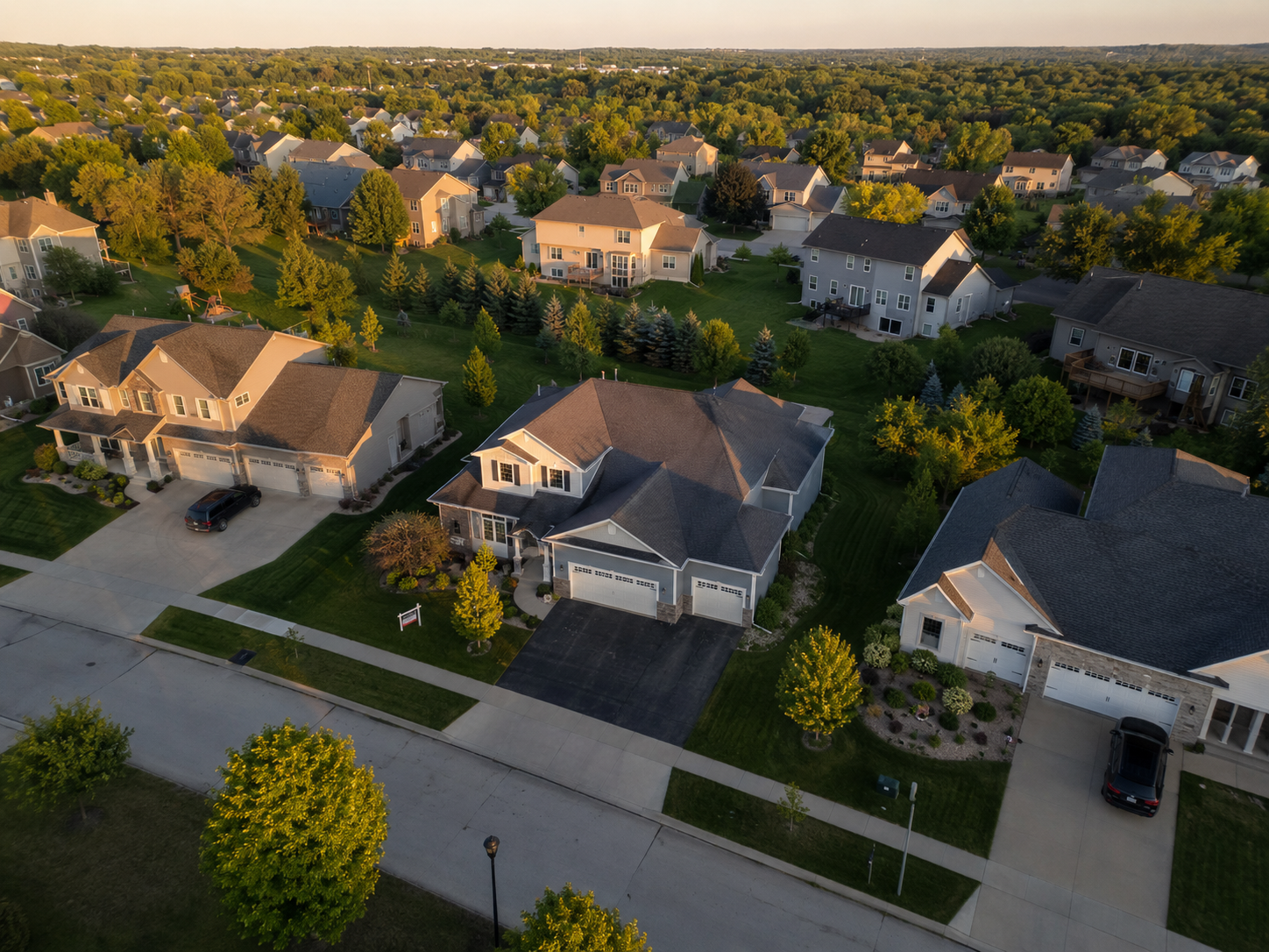Aerial view of a suburban neighborhood with steady inventory of well-kept homes
